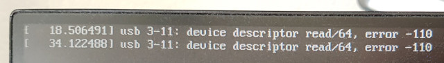 Photo of part of an LCD showing two lines with the same error message: usb 3-11: device descriptor read/64, error -110